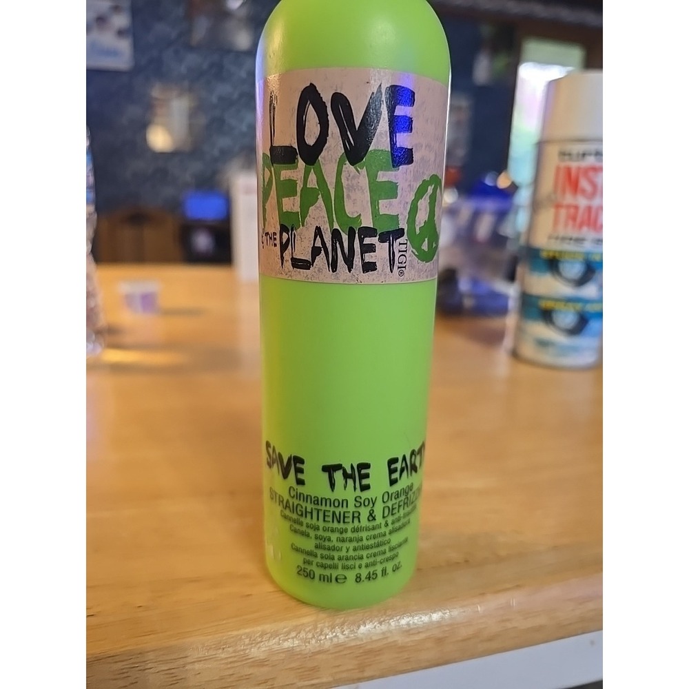 TIGI Straightenerโ and Defrizzer 8.45 Oz Love Peace The Planet Save The Earth